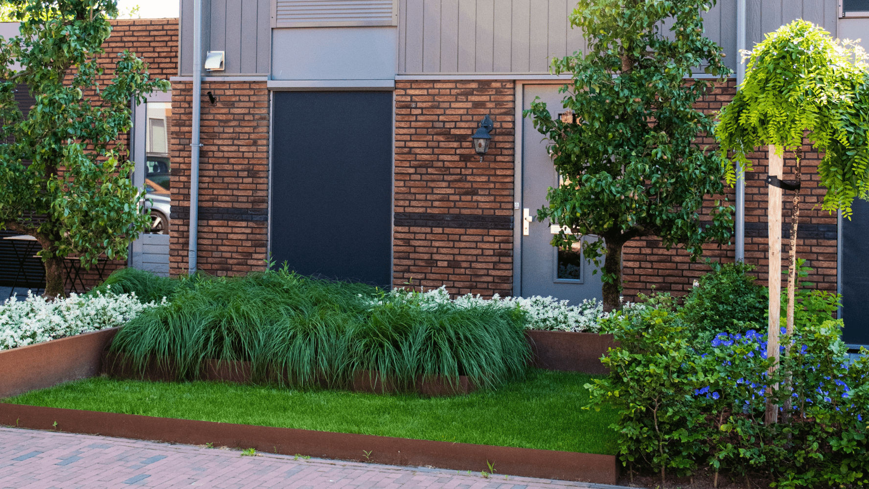 Voorzijde woning met Screens - STERK Zonweringen